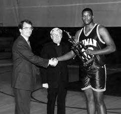 1992 Tournament MVP Marc Jackson, GonzagaPresident Rev. Bernard Dooley, S.J.