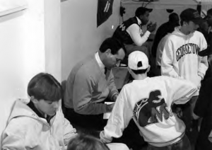 1994 - Coach K signs autographs at the tournament