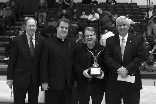 2011 Pedro Arrupe Award winner Mike Curtin, founder of DC Central Kitchen, with John McLaughlin, President Planning and Tournament Co-Chair Jim Hanagan